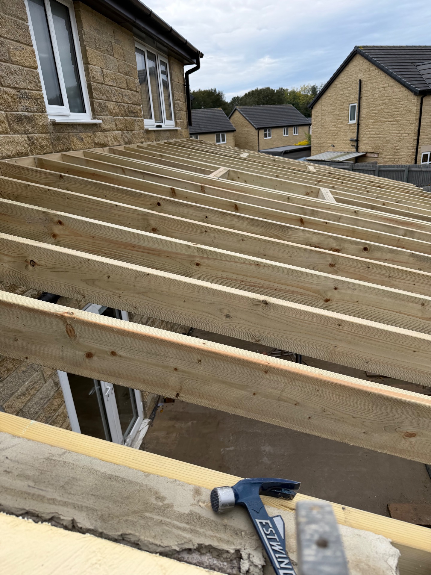 Hand-cut and trussed roofing